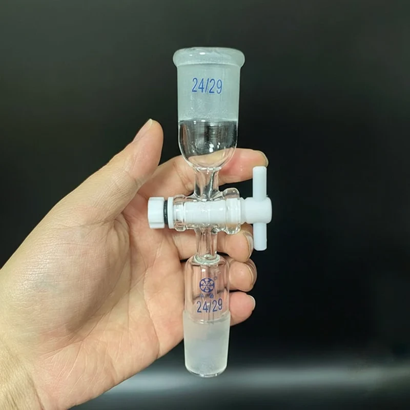 Adattatore di controllo del flusso con rubinetto di arresto in PTFE