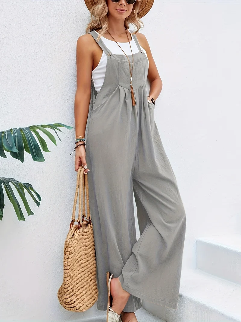 Tuta boho a tinta unita lunga smanicata, tuta baggy casual con tasche, abbigliamento da donna