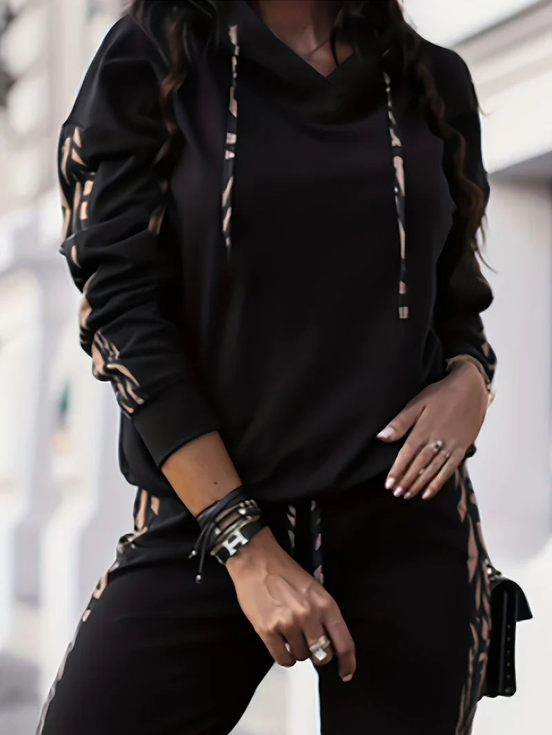 Set casual a righe in due pezzi, top con cappuccio e pantaloni lunghi allentati con coulisse, abbigliamento da donna