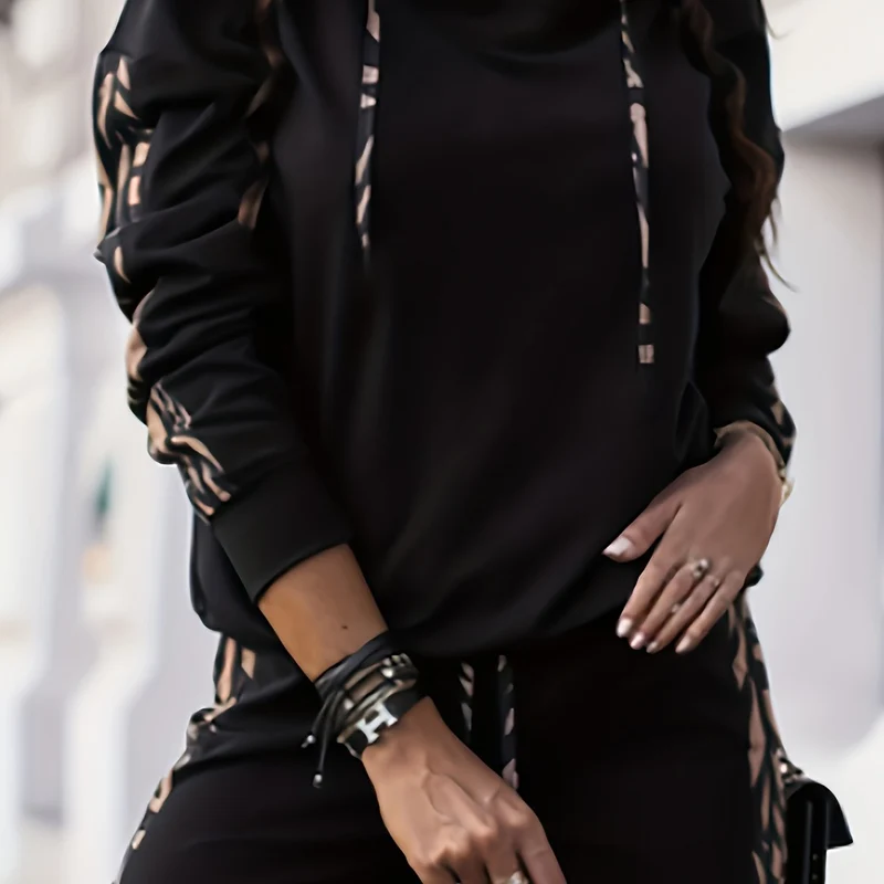 Set casual a righe in due pezzi, top con cappuccio e pantaloni lunghi allentati con coulisse, abbigliamento da donna