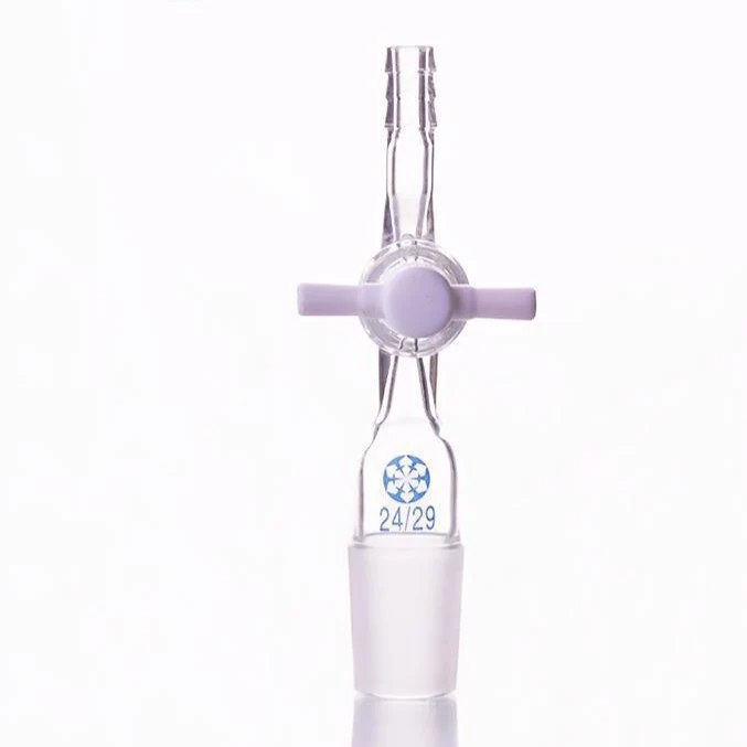 Adattatore di collegamento con raccordo per tubo flessibile e rubinetto di chiusura in PTFE